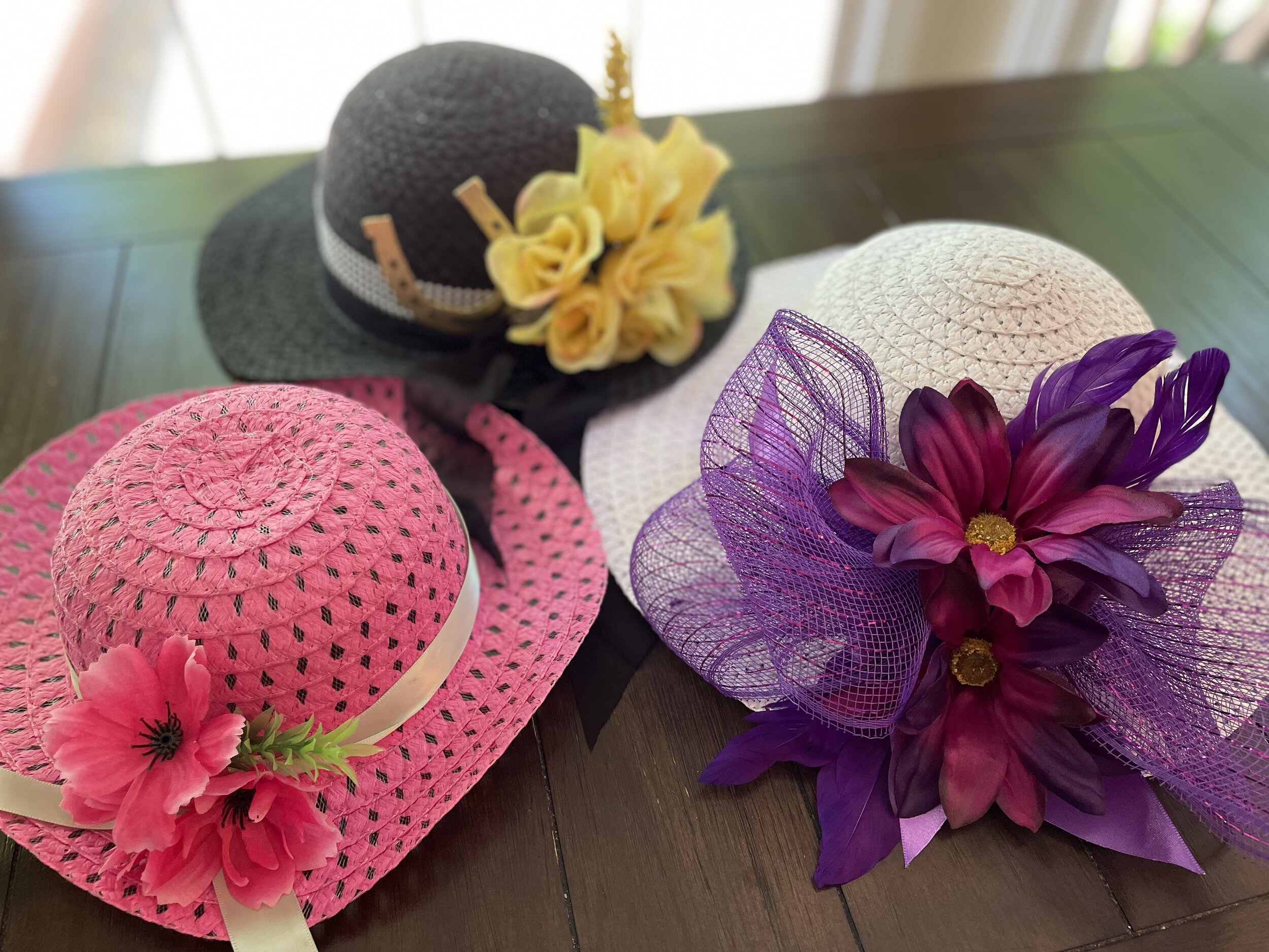 Here are the three hats I’ll be showing you how I easily made. Two adult hats (white and black) and one girl’s hat (pink.)